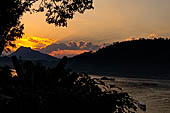 Luang Prabang, Laos - Sunset along the Mekong riverfront.  